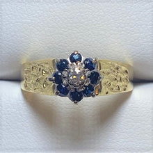 Load image into Gallery viewer, Secondhand 18ct Gold Sapphire and Diamond Cluster Ring with Bark Effect Shoulders