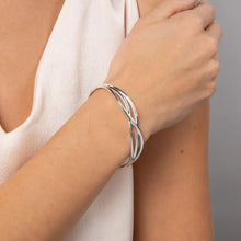 Load image into Gallery viewer, Cross Over Bangle.
