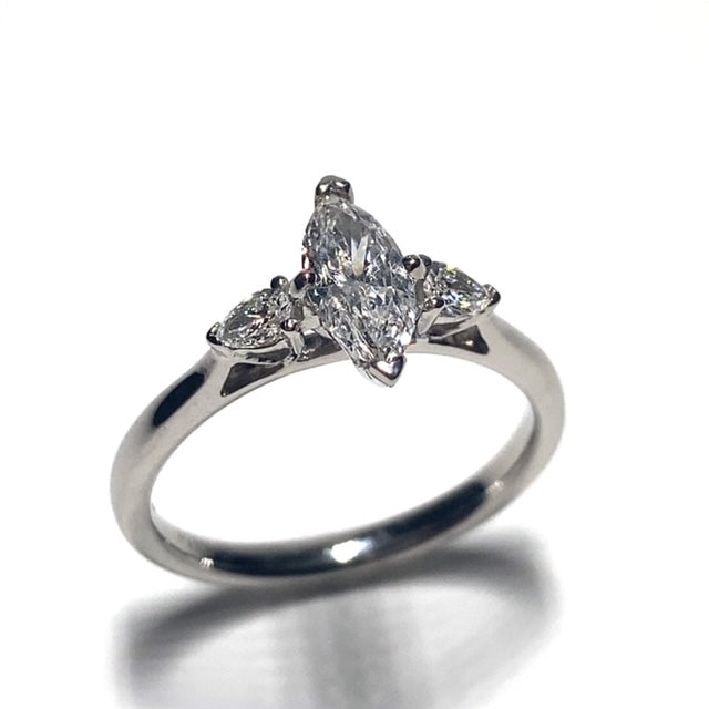 Platinum  0.72ct Marquise and Pear Shaped Diamond Three Stone Ring