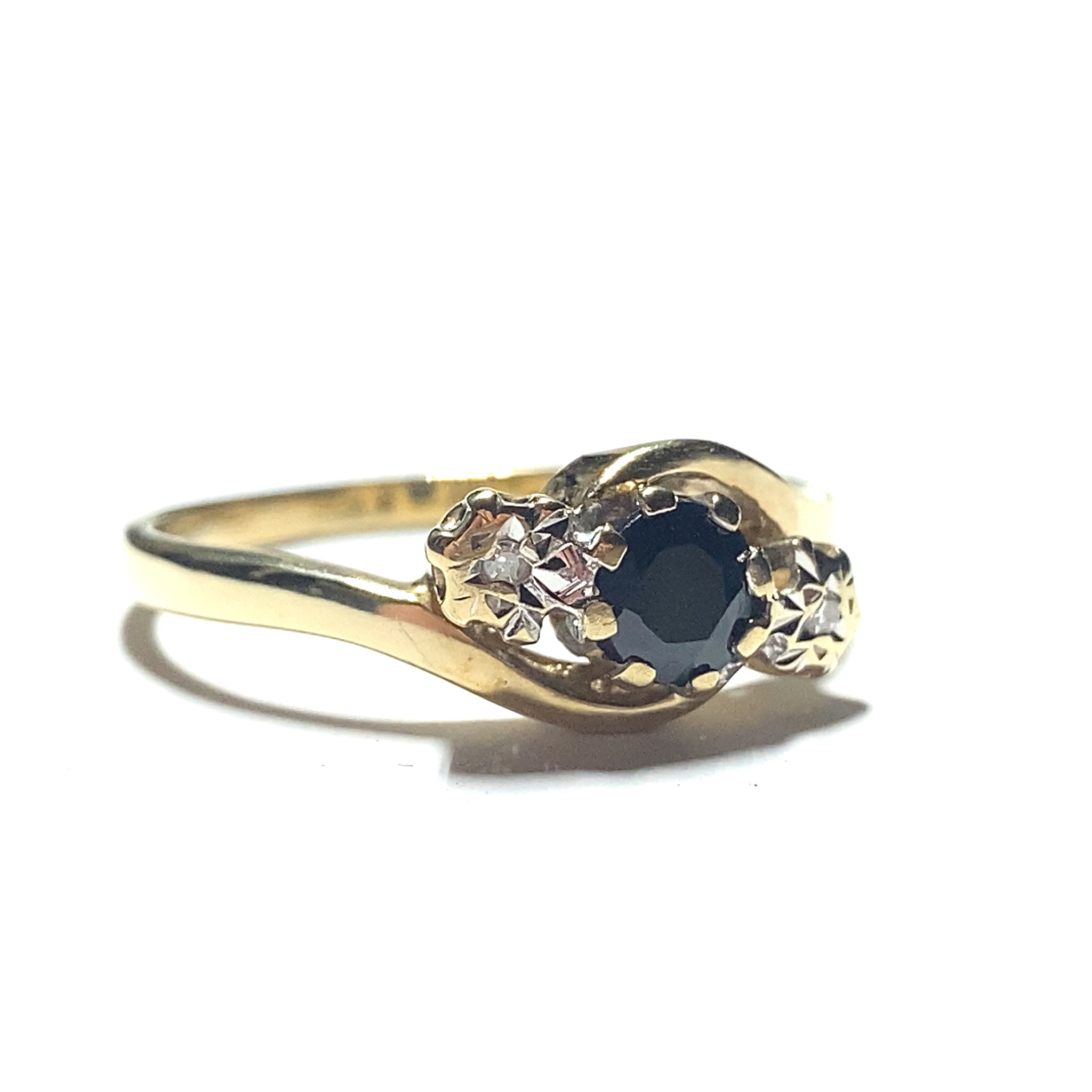 Sapphire and hotsell diamond twist ring