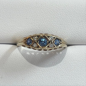 Secondhand 9ct Sapphire and Diamond Boat Set ring